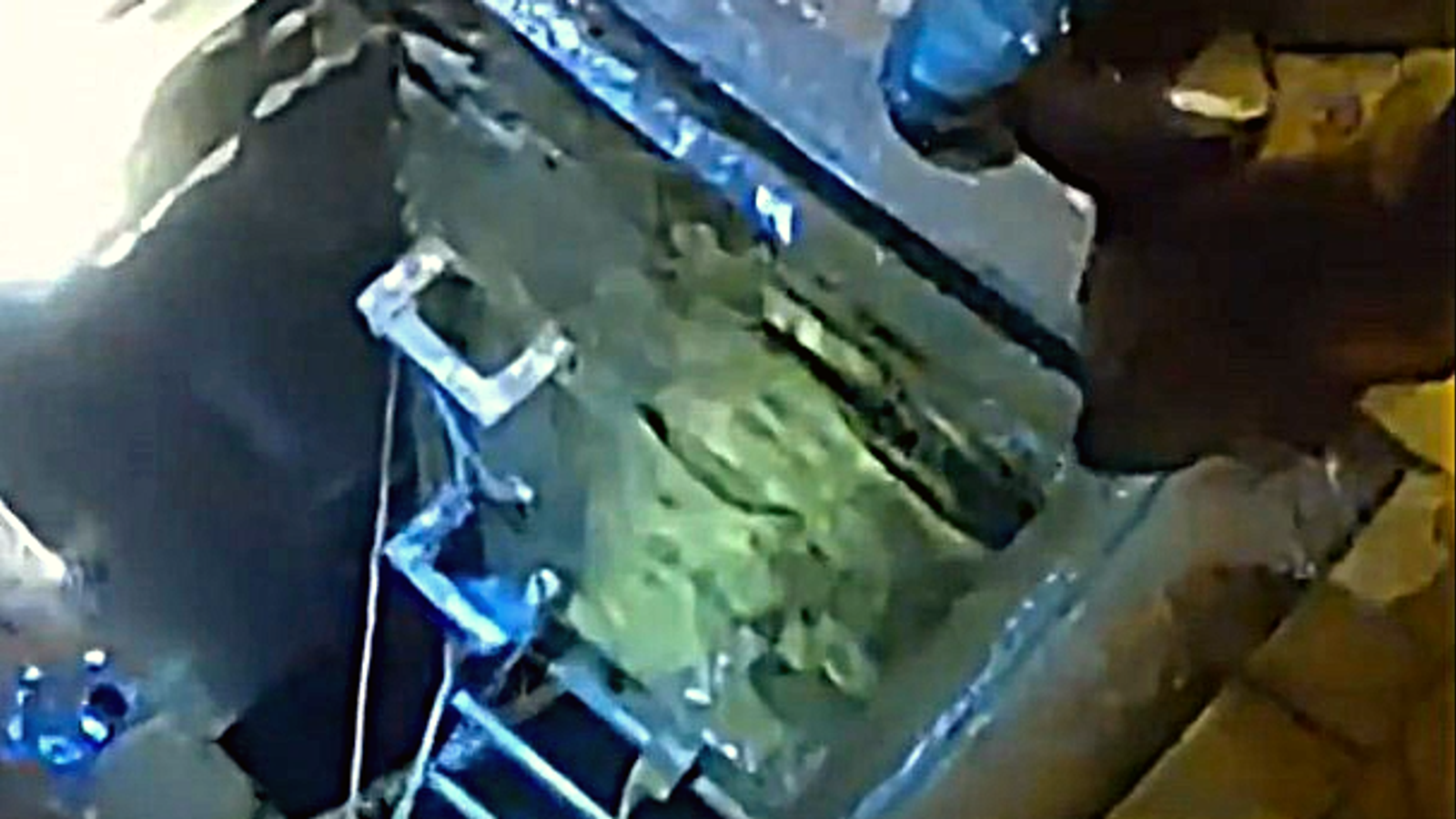 Watch: Suspected cable thief arrested as he emerges from underground