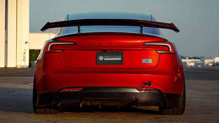 This absurdly large wing on a Tesla Model 3 actually works