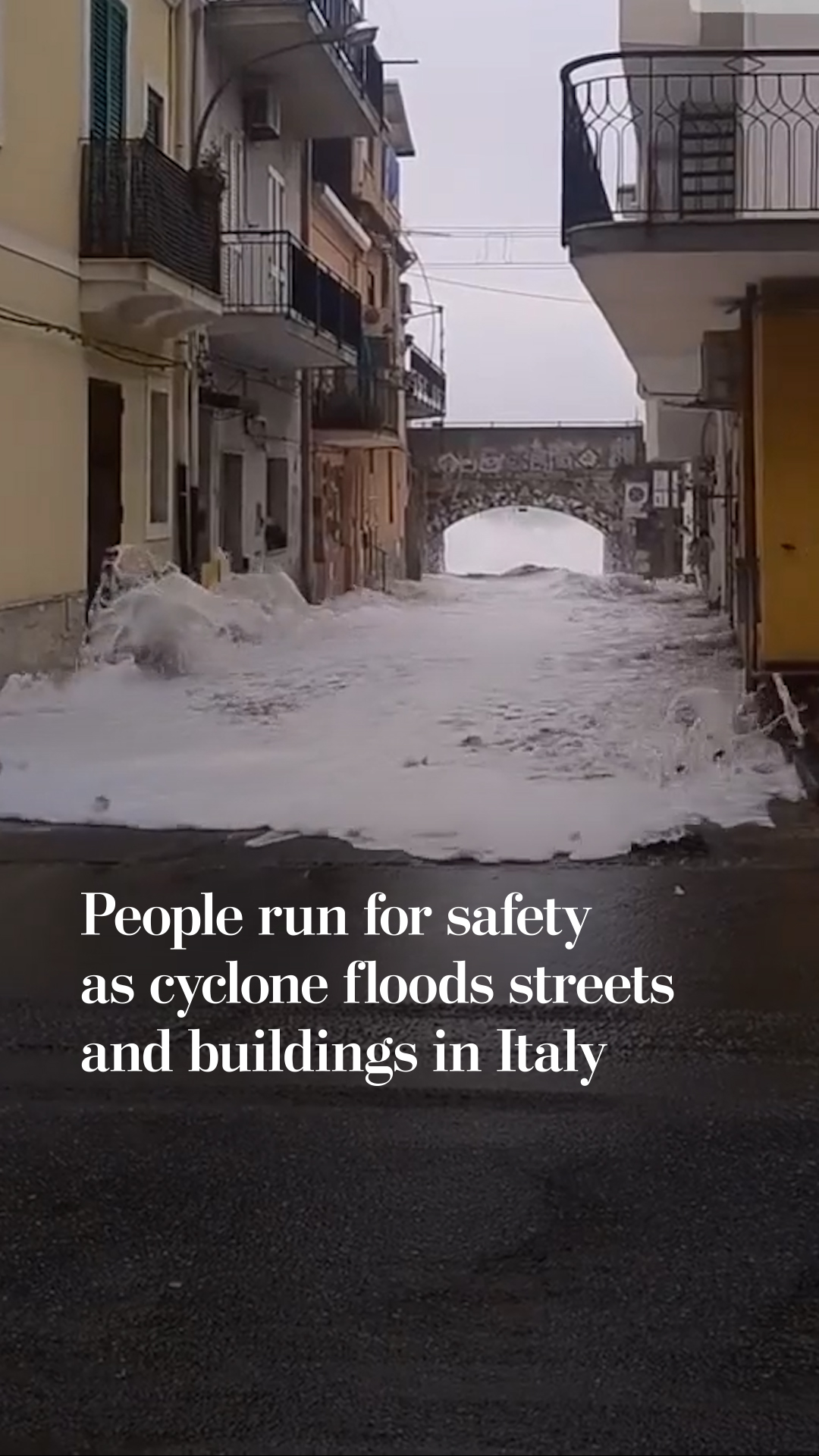 People run for safety as cyclone floods streets in Italy