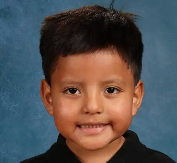 Picture that shames US: Five-year-old boy detained by ICE after pre-school