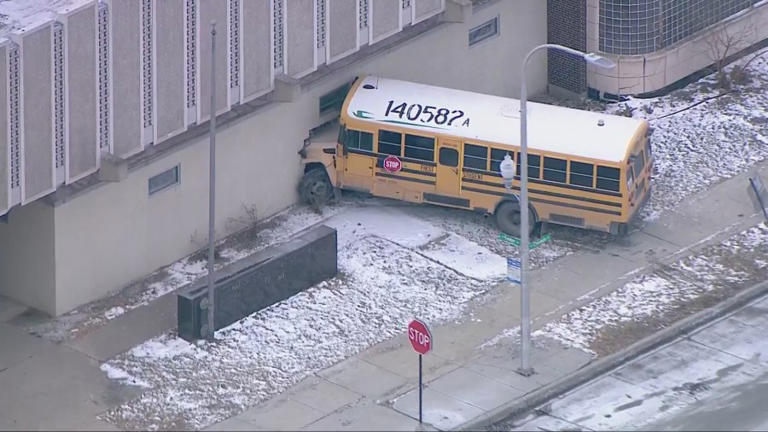 School bus crashes into building on West Side