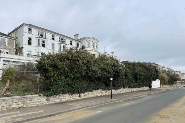 'Ransom strip' of land at front of a derelict seafront hotel sold for £100k