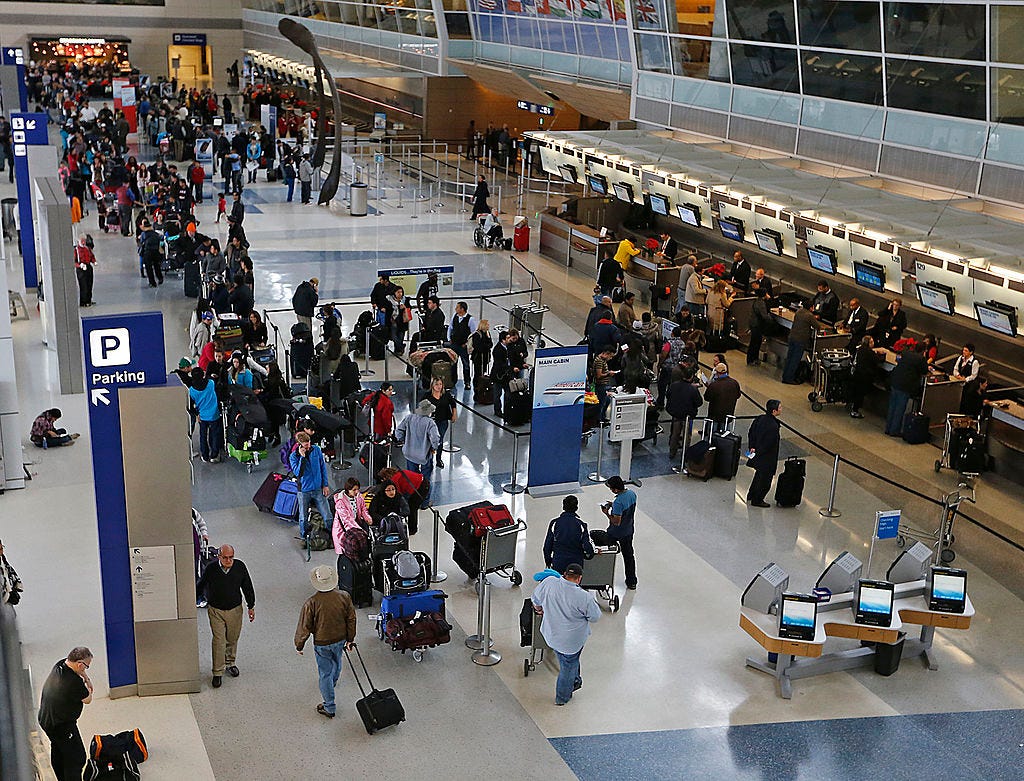 US airlines roll out sweeping travel waivers as a powerful winter storm ...