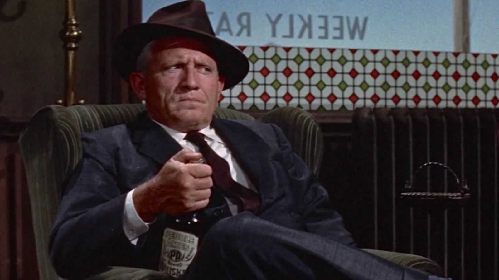 John J Macreedy sits in a chair in Black Rock
