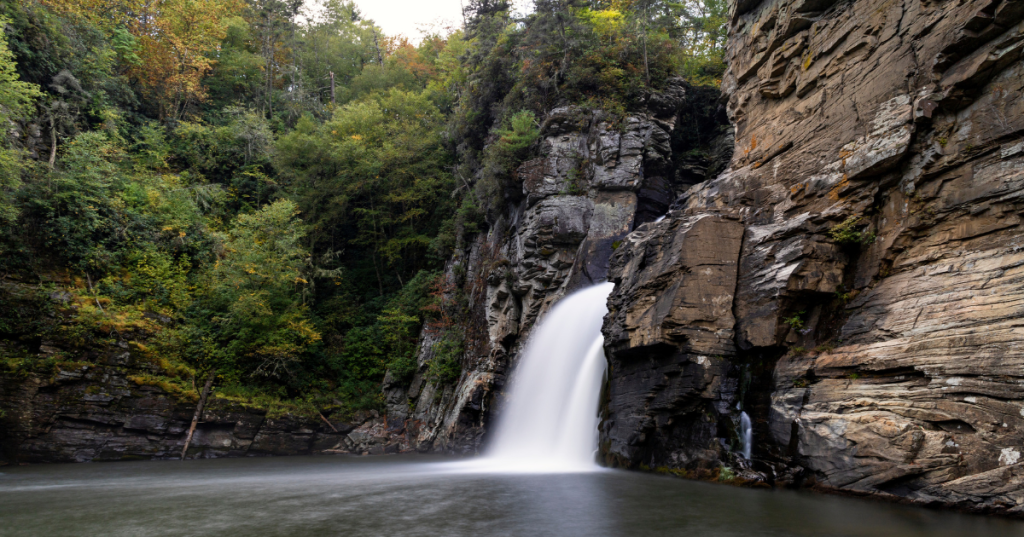 The water of Linville Falls crashing into the pools below amidst the forests of the Blue Ridge Parkway.