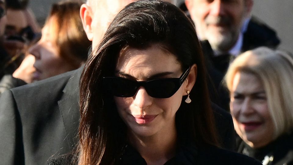 Anne Hathaway, who regularly wore Valentino on the red carpet, arrived at the funeral ceremony for the late Italian fashion designer. - Stefano Rellandini/AFP/Getty Images