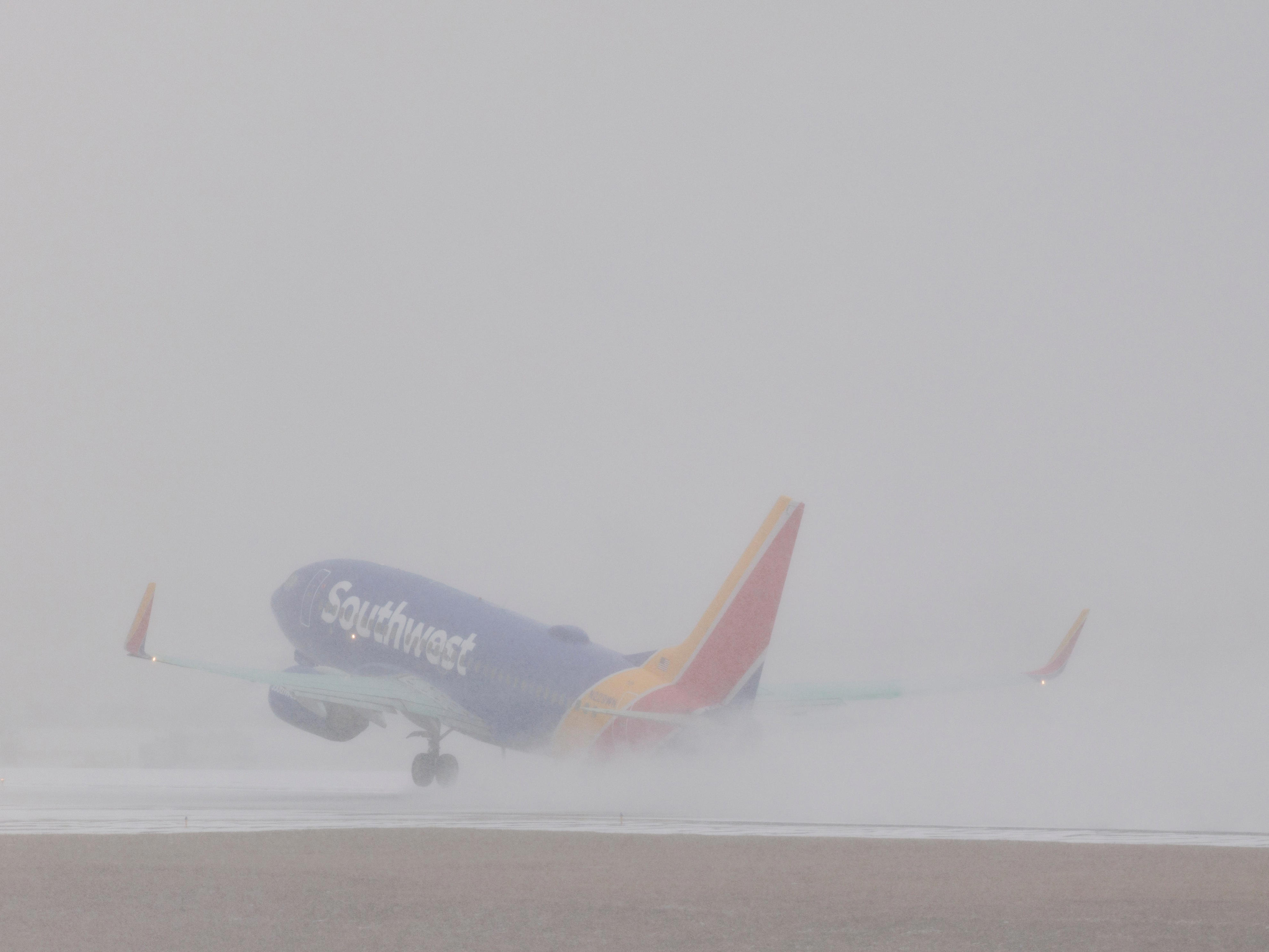 More flights canceled as huge winter storm grips the US. Here's what to ...