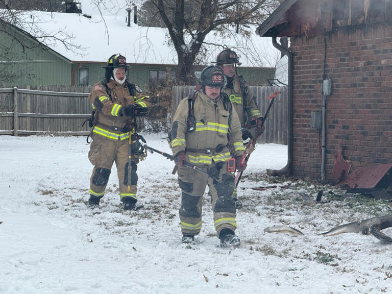 Elderly woman rescued from burning home in Rogers