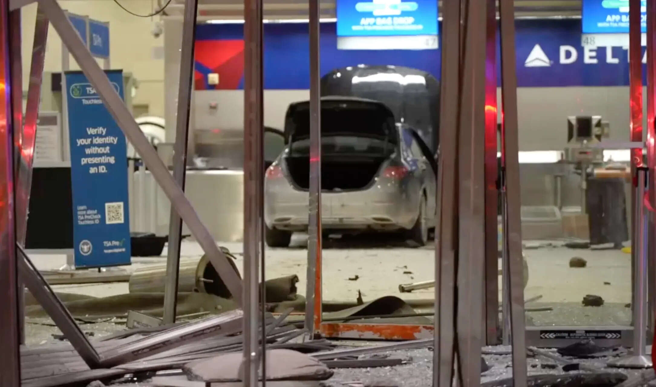Car crashes into Detroit airport terminal: 6 injured, suspect in ...