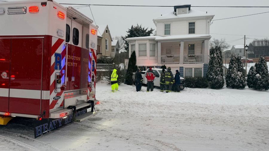 Truck slides off roadway, crashes into Arlington home