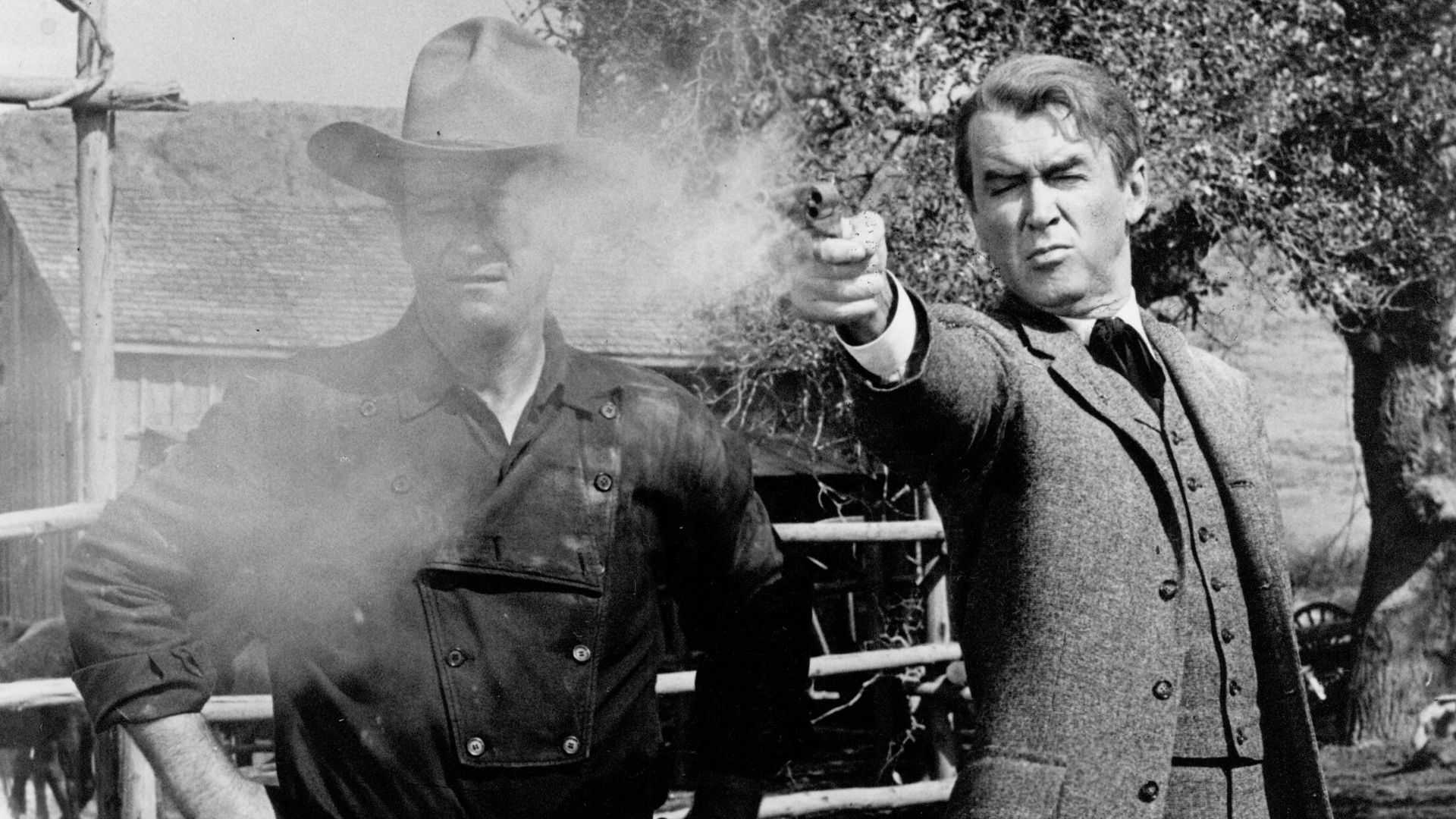 John Wayne as Tom teaching James Stewart as Rance to shoot in The Man Who Shot Liberty Valance