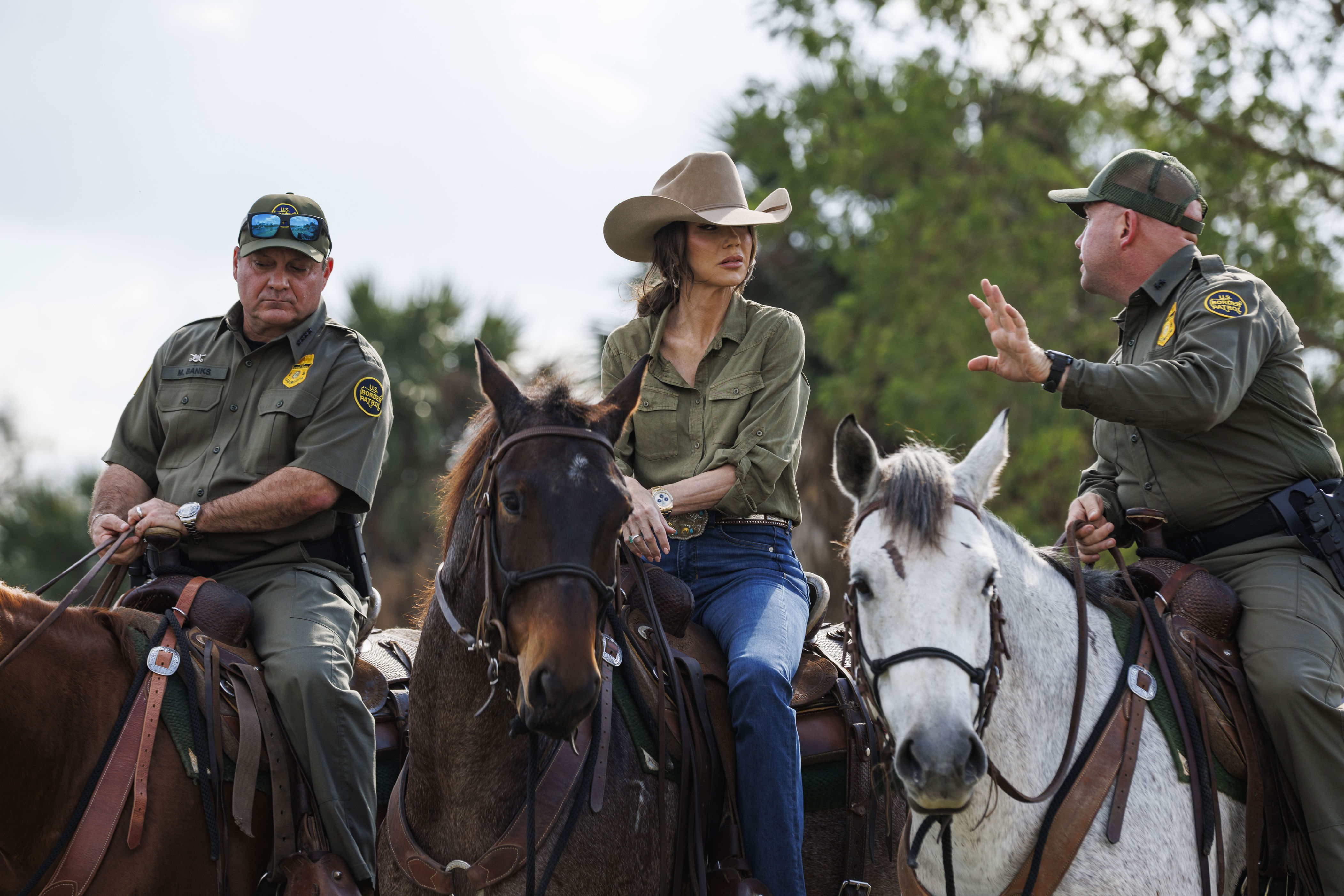 Noem tours the bank of the Rio Grande on horseback alongside U.S. Border Patrol Chief Mike Banks, left, and U.S. Border Patrol Rio Grande Valley Sector Chief Jared Ashby on Jan. 7, 2026 in Brownsville, Texas.