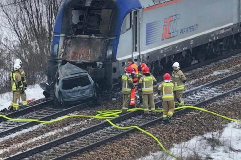 Poland train horror as two collide with car stuck on tracks as 600 ...