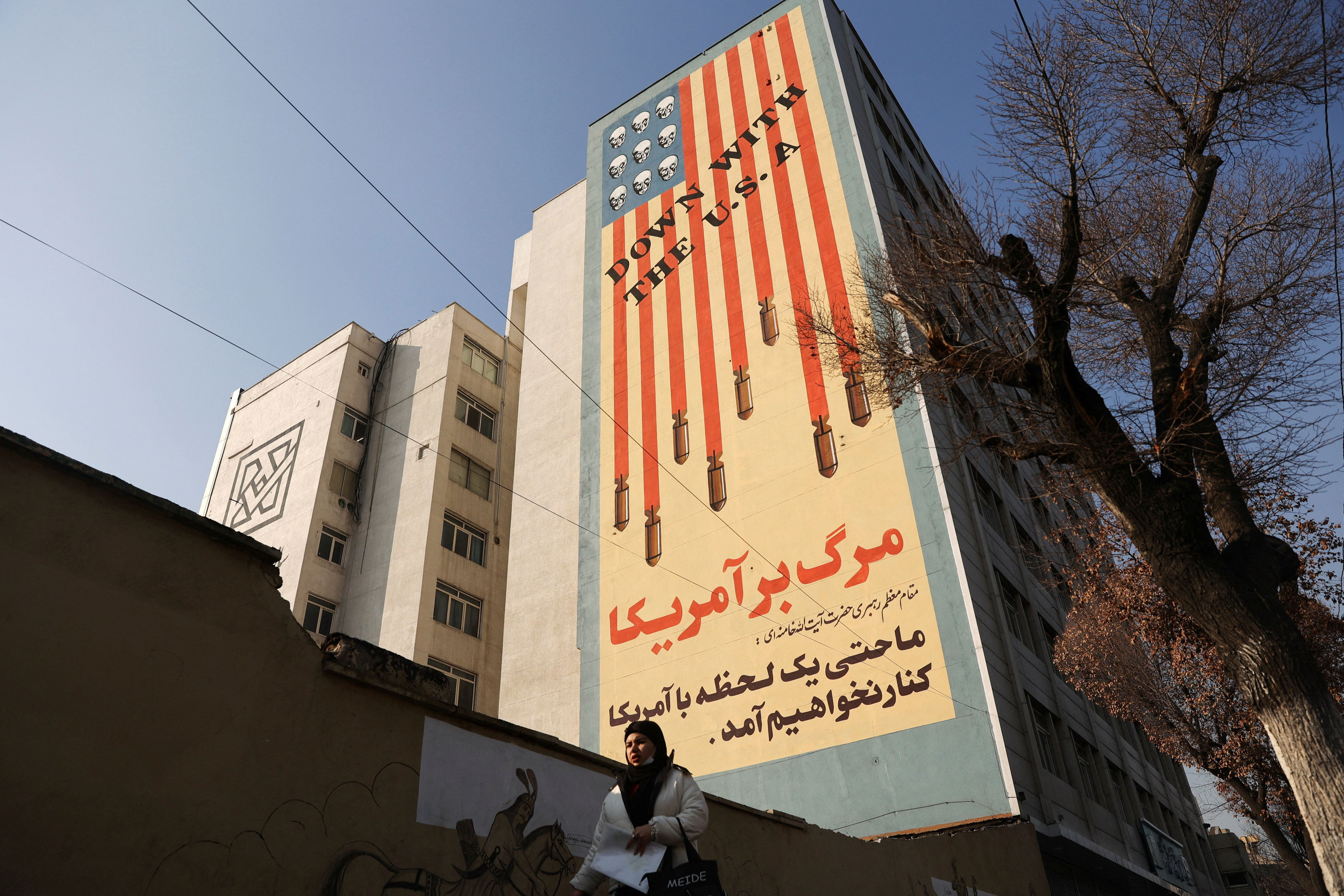 Iran unveils mural warning of retaliation after Trump threats