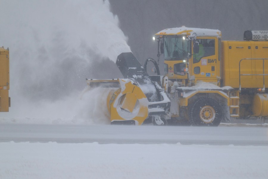 Photos: Winter storm dumps snow at BWI Airport, cancels hundreds of flights<br><br>