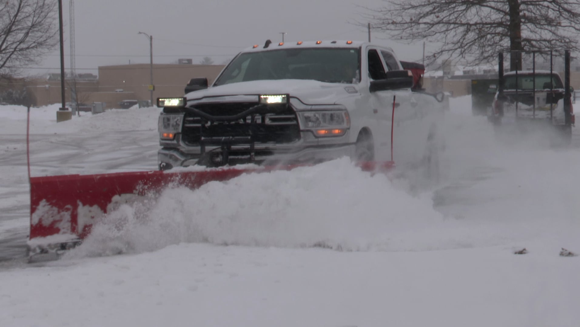 Snowplow crews work to clear roads as winter weather continues