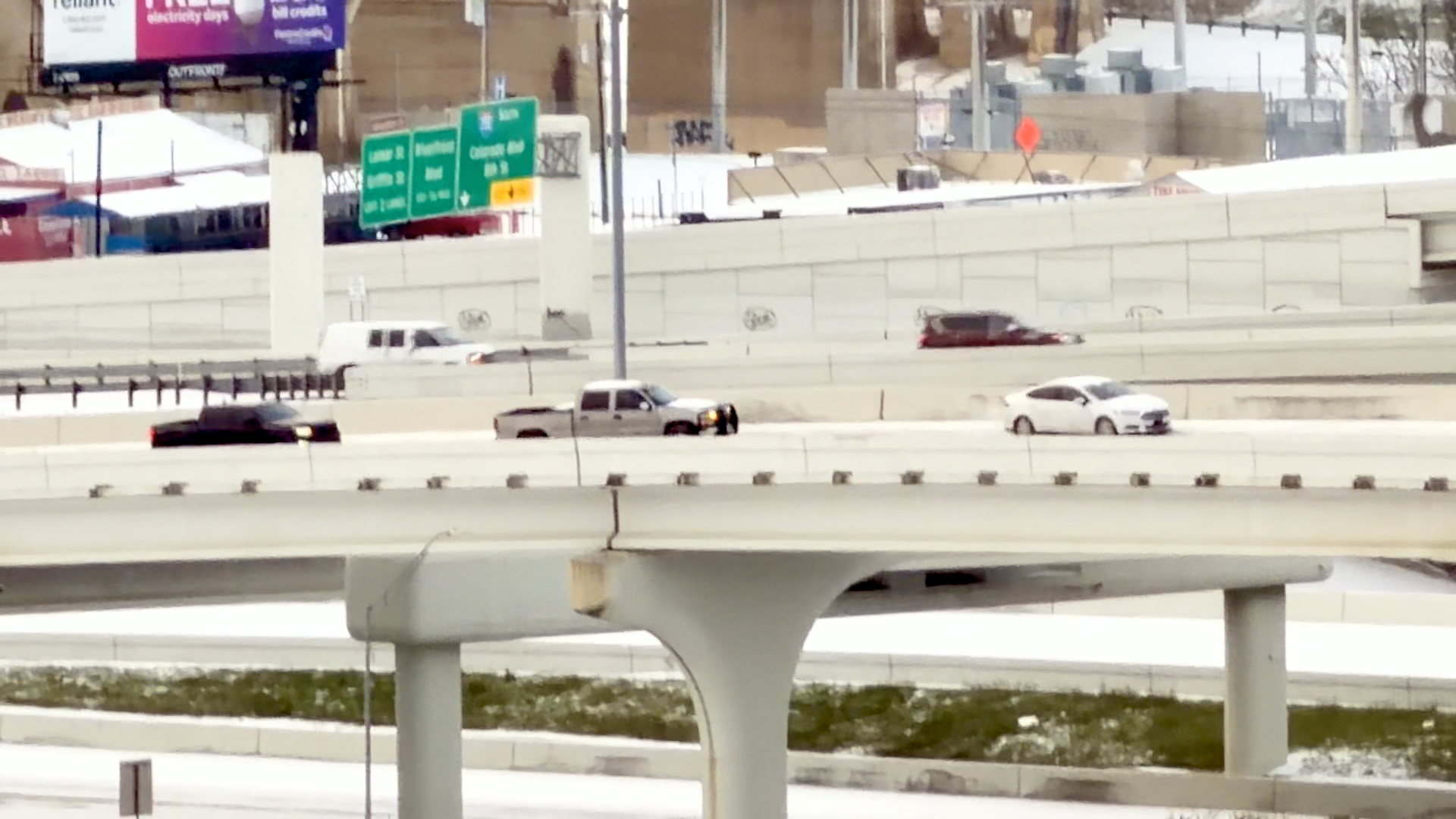DFW road conditions: Cars struggle along I-30 near I-35E in downtown Dallas