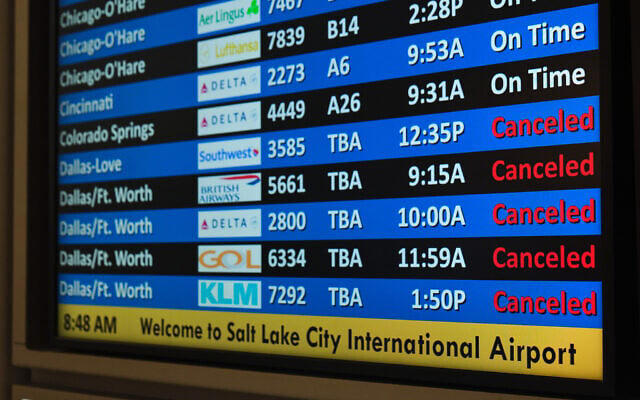 Brutal US travel day as more than 13,500 flights canceled amid massive ...