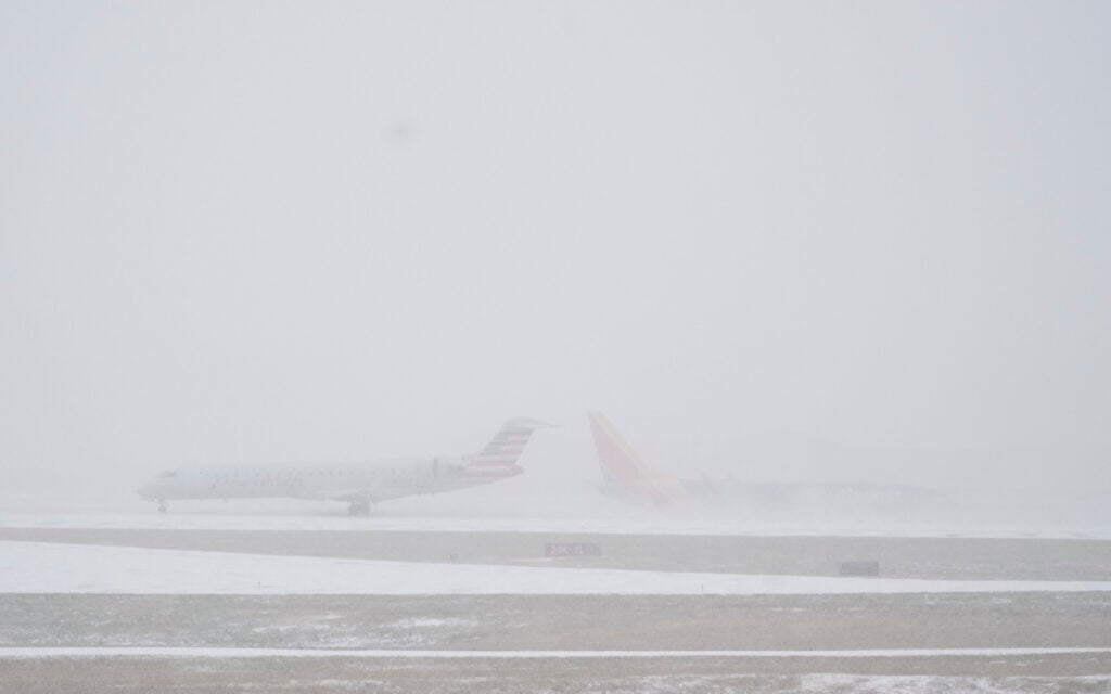Brutal US travel day as more than 13,500 flights canceled amid massive ...