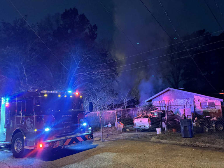 Firefighters battle house fire on McLean Street in the bitter cold
