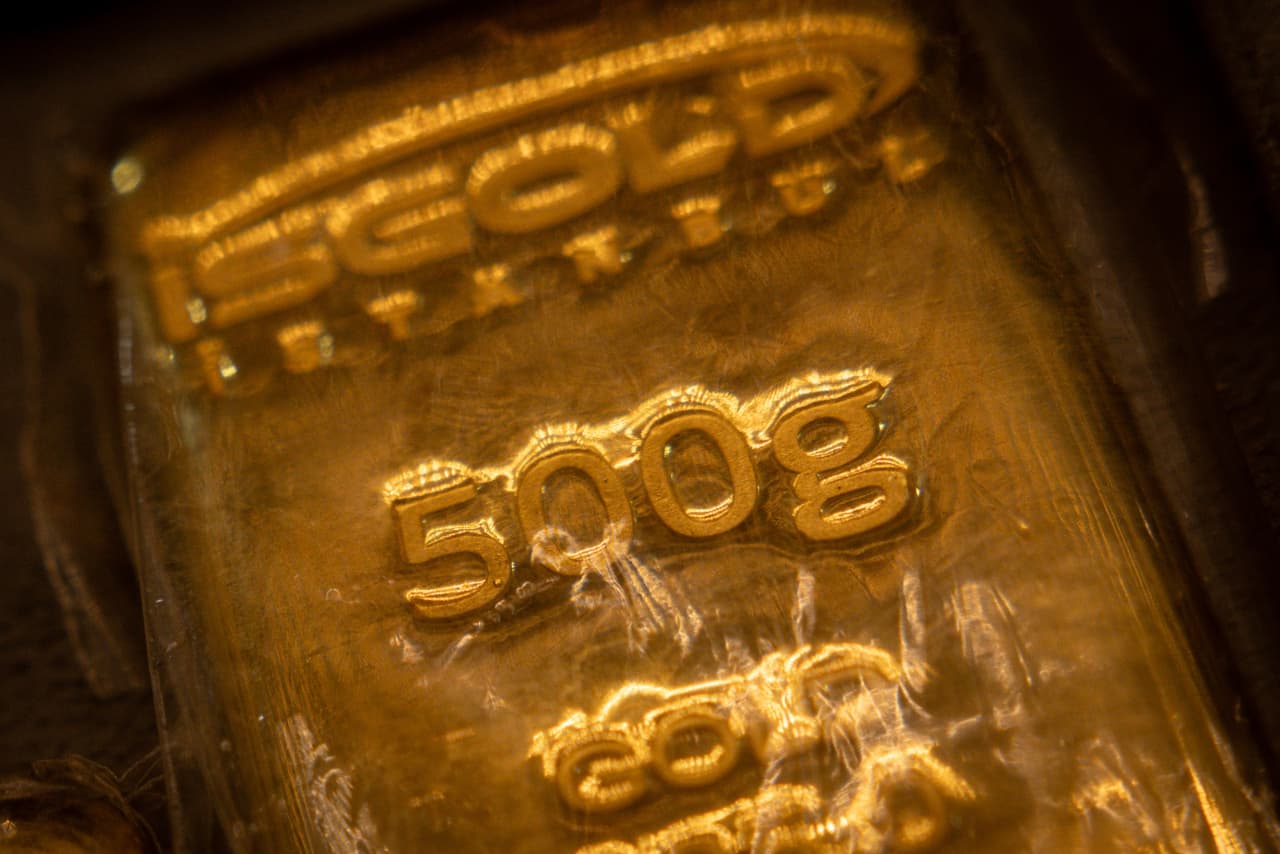 Gold surges past $5,000 for first time, silver soars again. Why they ...