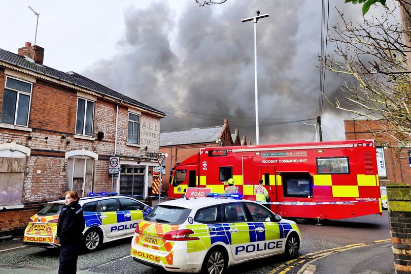 80 firefighters tackle huge factory blaze as 'explosions' heard