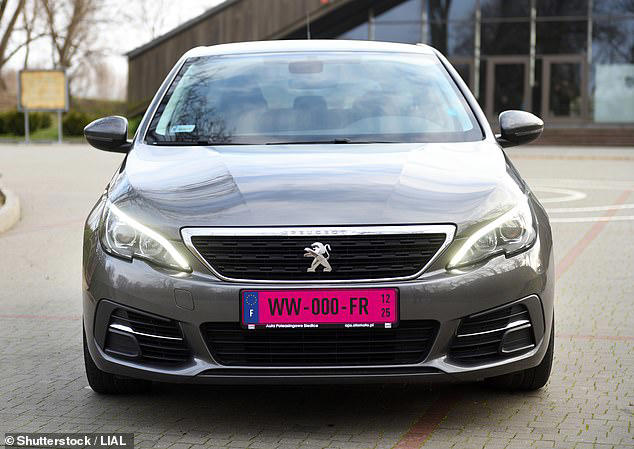 Why are cars in France using pink number plates?