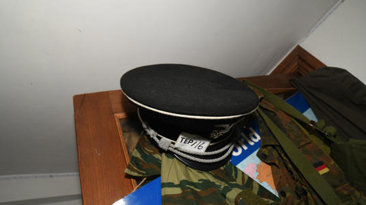 A Nazi-style hat found in the boy's bedroom in Northumberland. Pic: Duncan Gardham / CPNE
