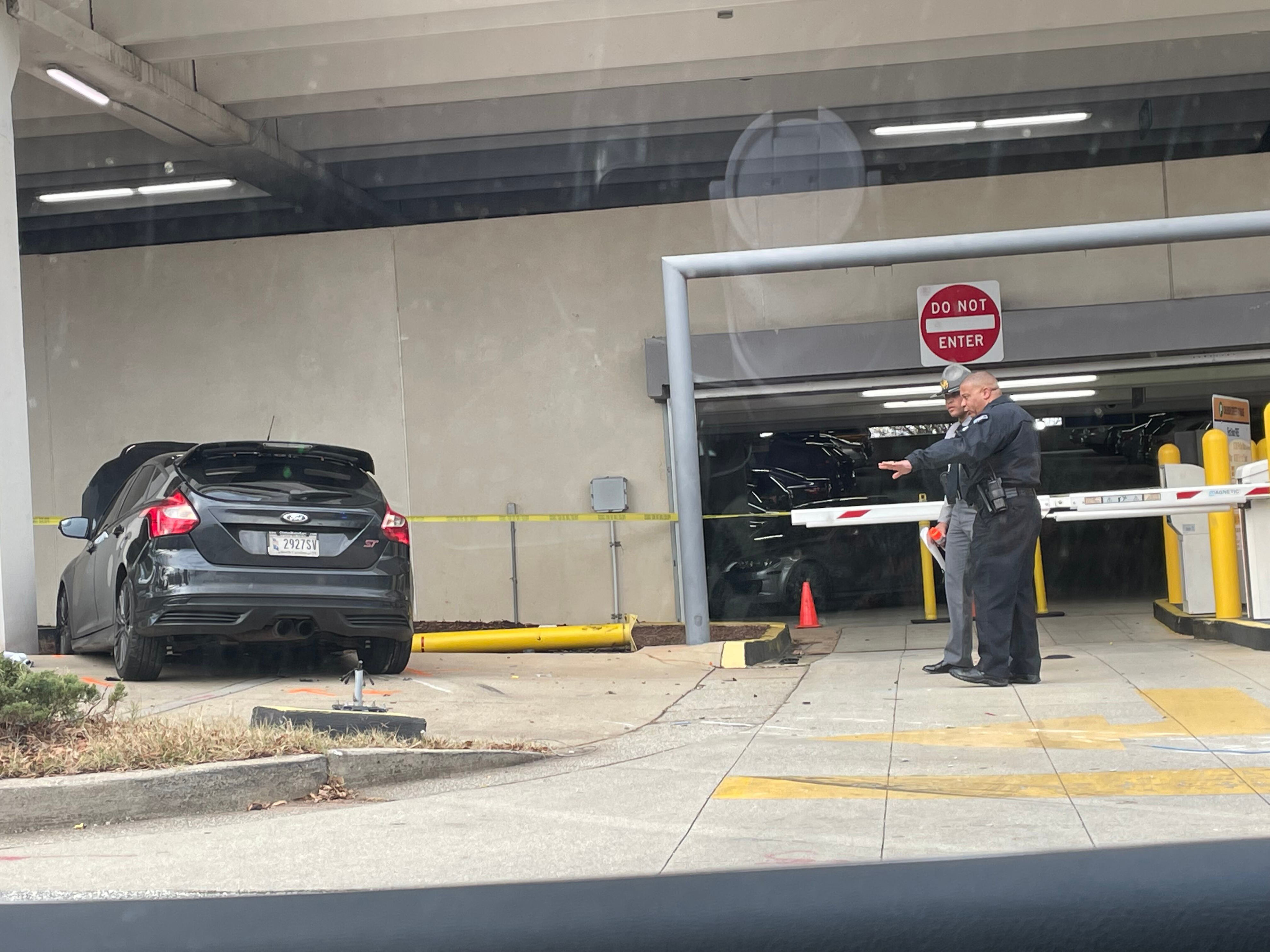 Suspect arrested after crashing into parking garage, running from police