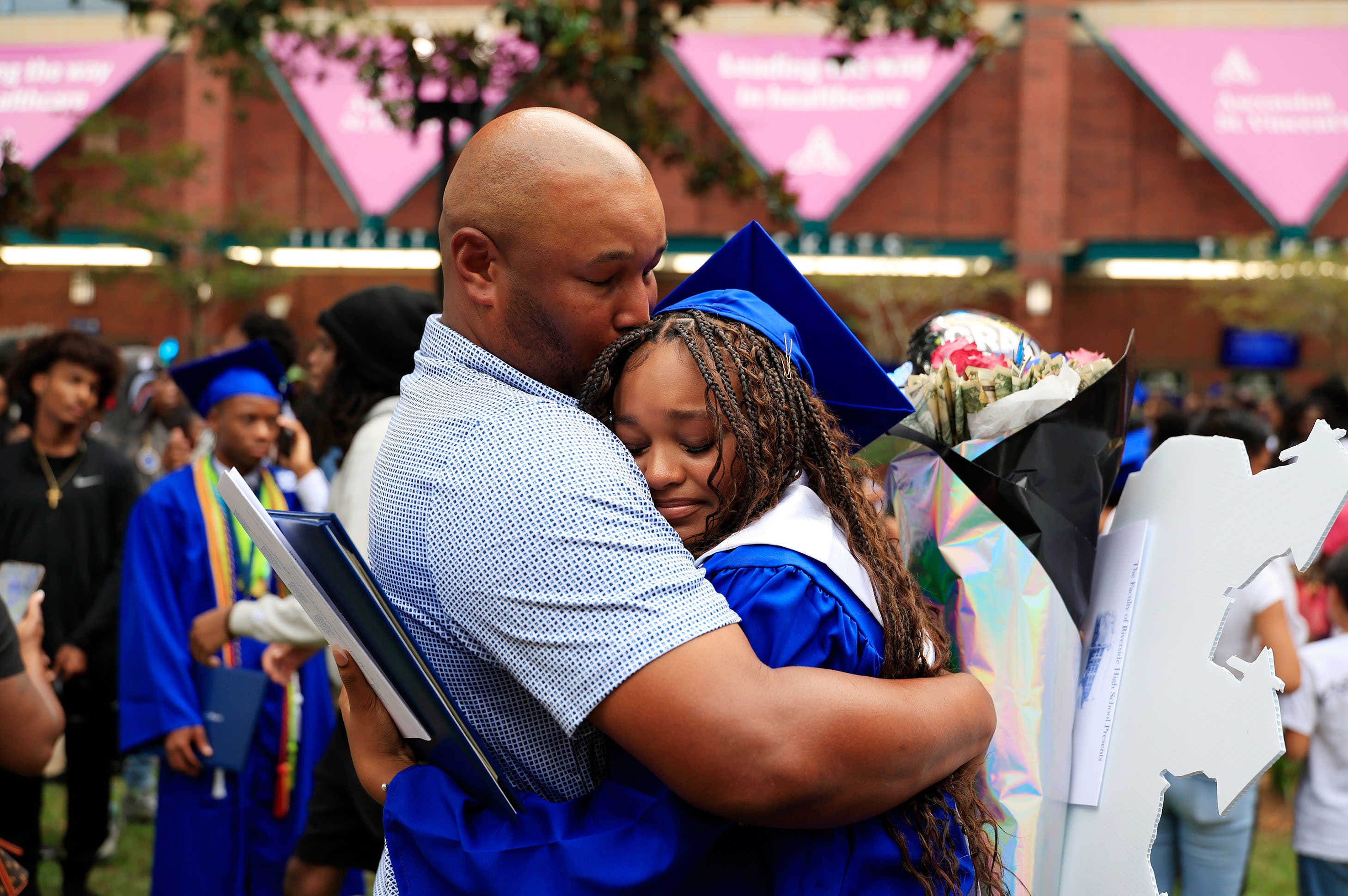 Outpacing state, Duval schools cheer record-breaking graduation rate