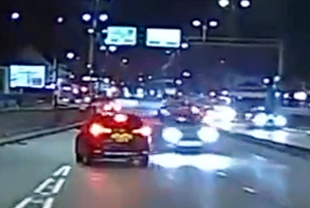 Driver narrowly avoids huge crash after hurtling wrong way down dual ...
