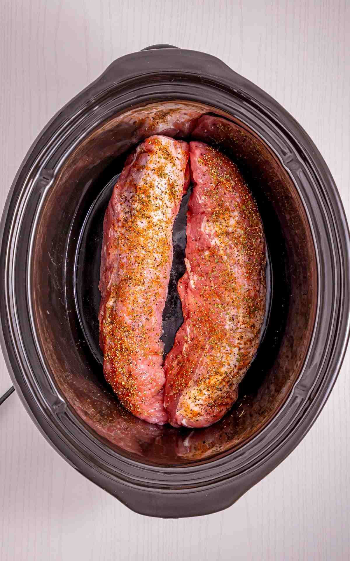 Dry rubbed pork tenderloins in a Crock Pot.