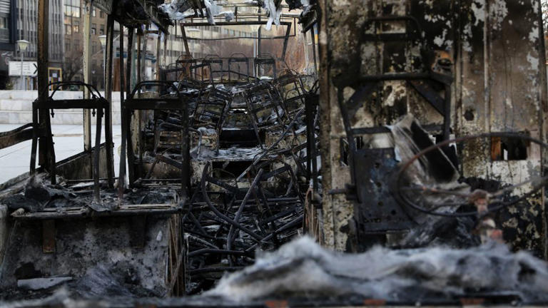 Burned municipal buses are seen in Tehran, Iran, on Thursday, following protests. - Fatemeh Bahrami/Anadolu/Getty Images