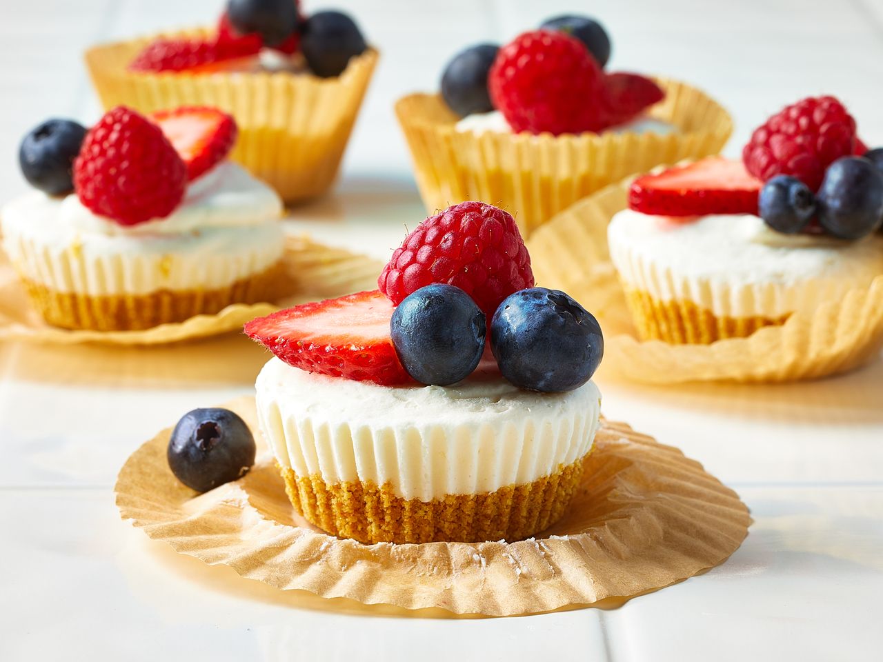 mini no bake cheesecakes topped with fresh fruit