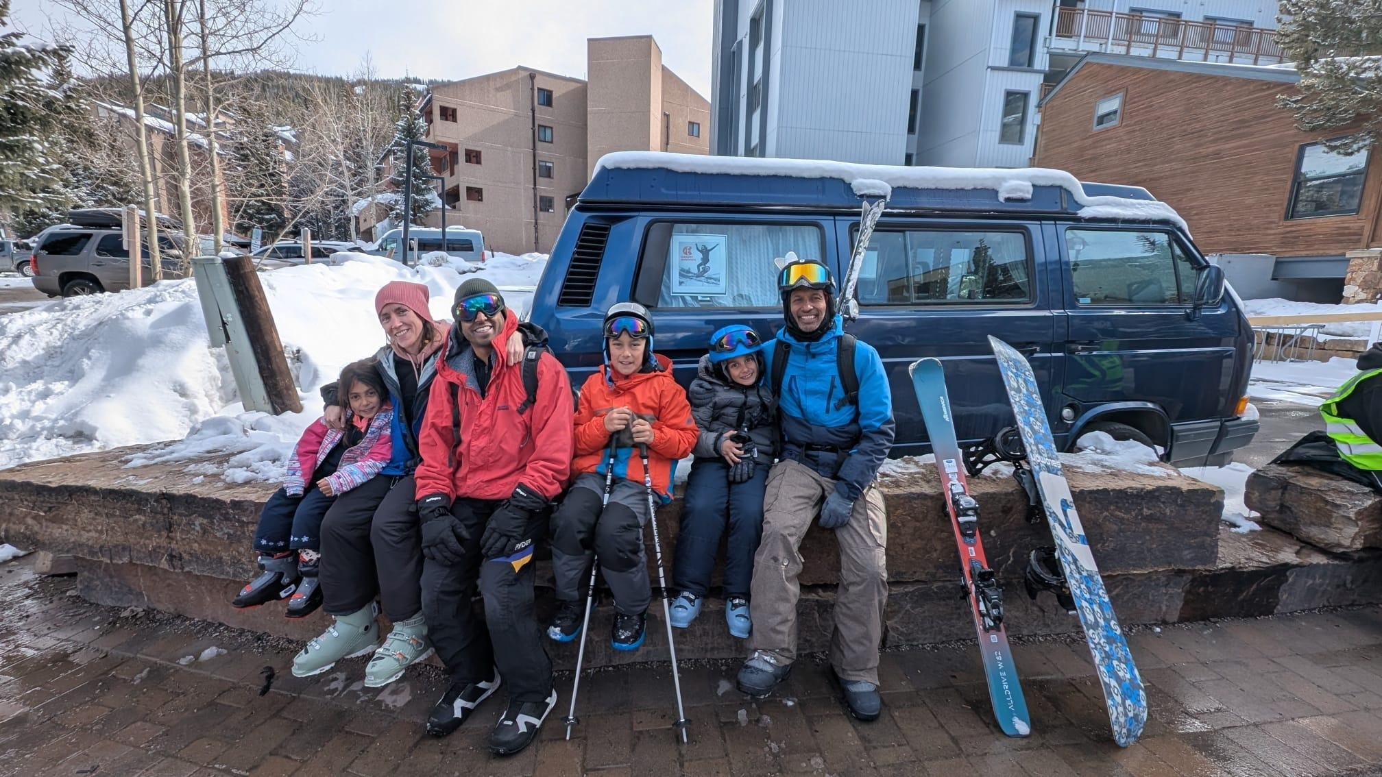 Shafiq Noorani (far right) is pictured with his brother Husein (third from left), Husein's wife Carly, and the couple's three children.