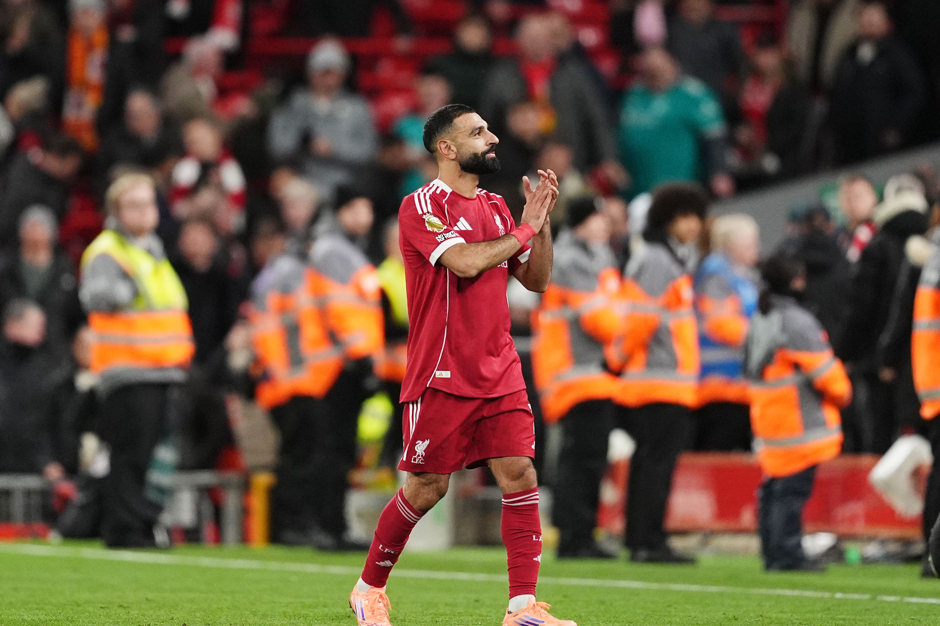 Mohamed Salah applauded the Anfield supporters before departing for Morocco (PA Wire)