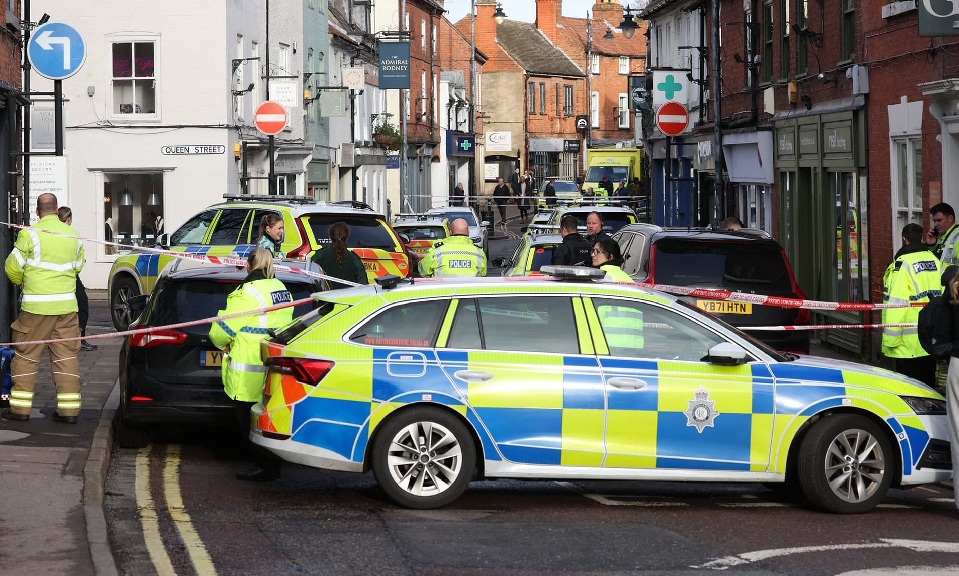Primary schools on lockdown as armed police swoop on town centre amid ...