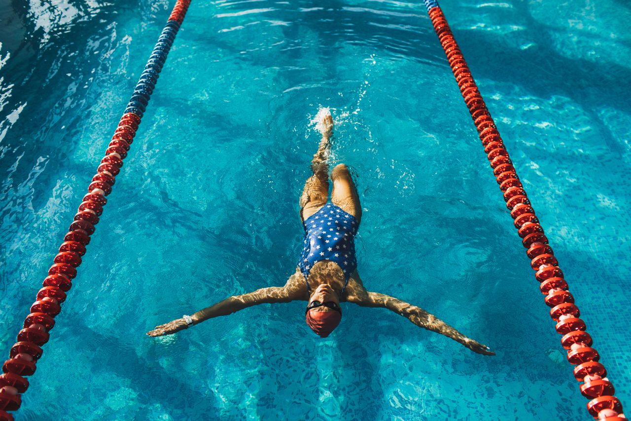 Swimming workout in pool.