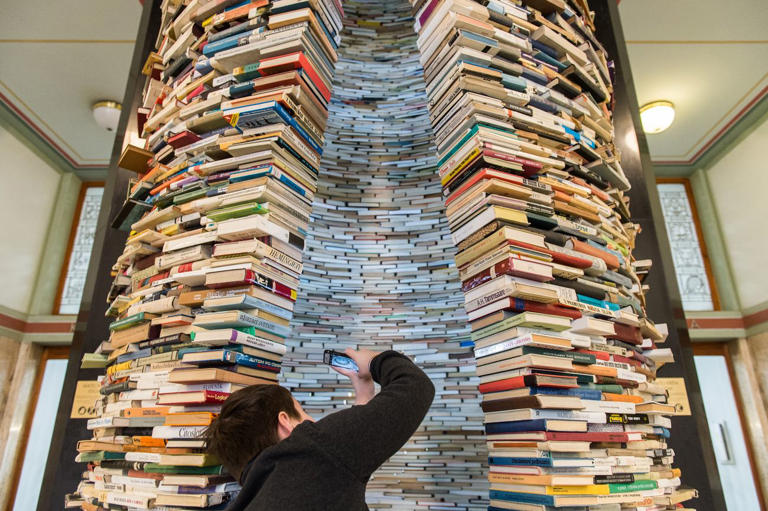 You can see a swirling sculpture made of 8,000 books at a library in Prague
