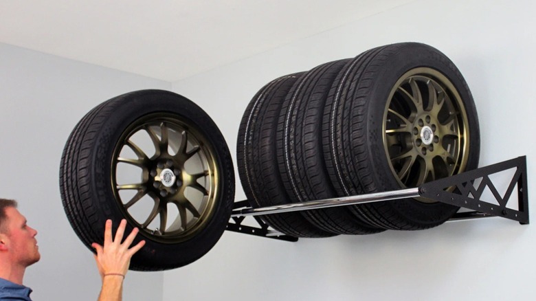Tires on wall-mounted tire rack