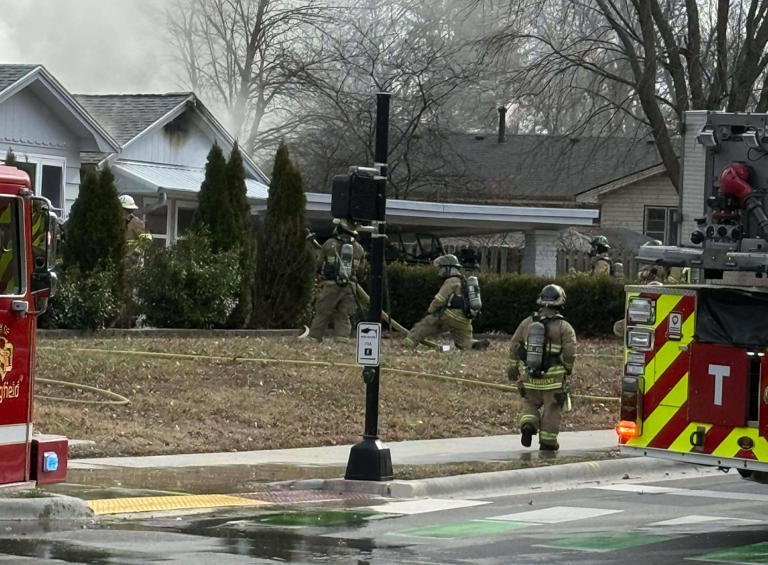 Crews battle house fire in Springfield