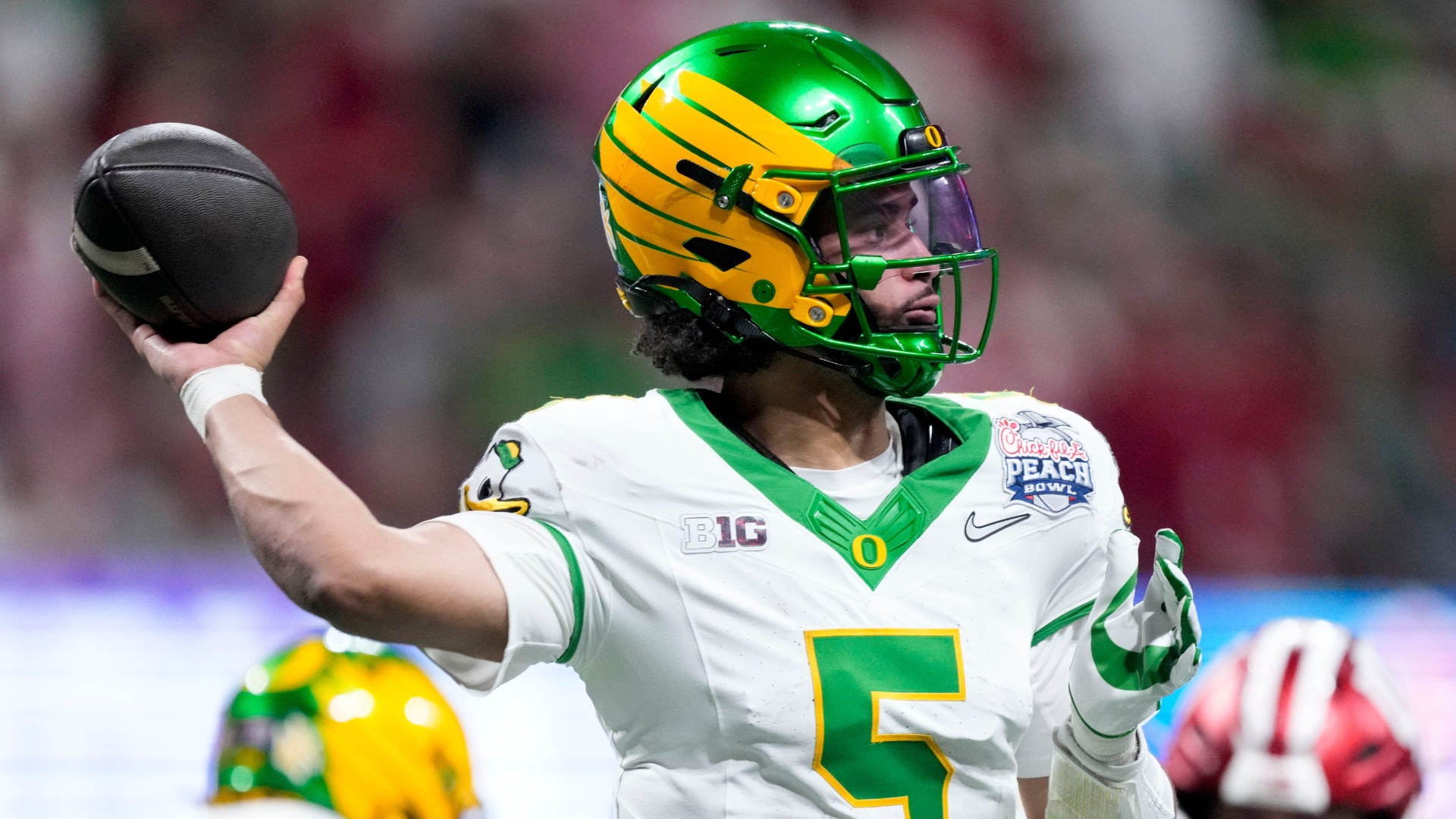 Dante Moore stays in school, Dylan Raiola transfers to Oregon