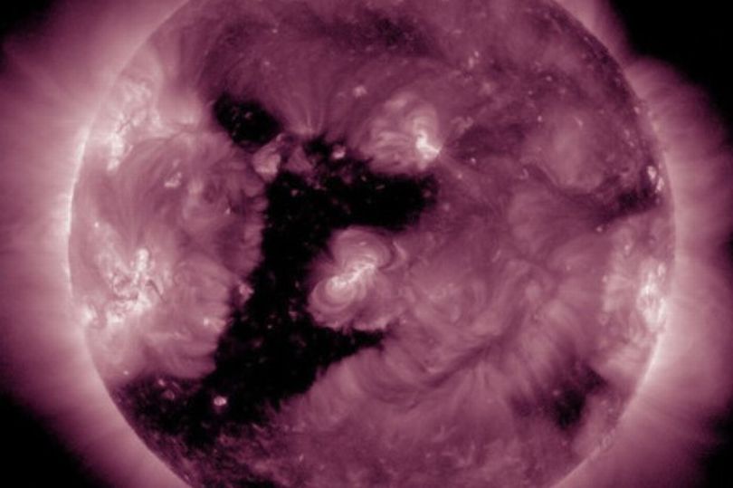 Experts find 1,000,000km hole in the sun shaped like inverted number one