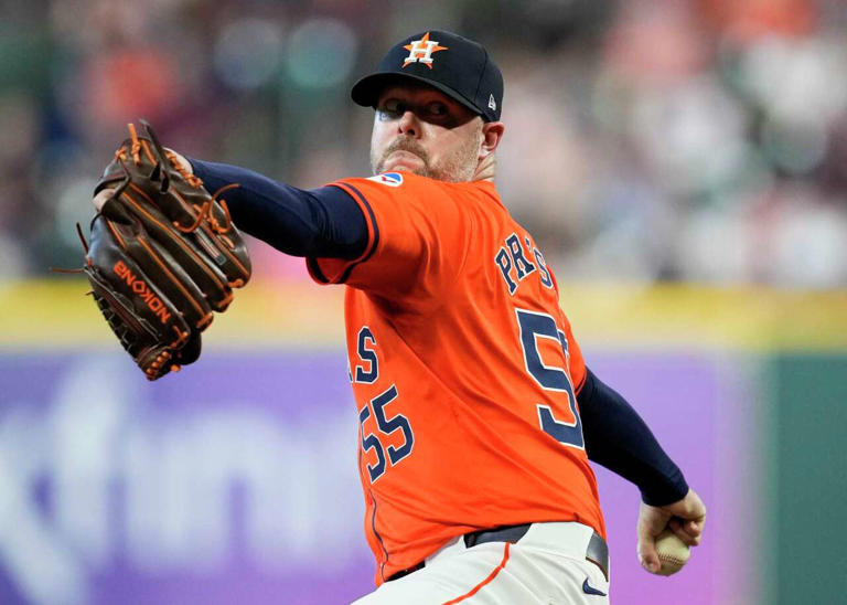 Houston Astros relief pitcher Ryan Pressly (55) delivers in the eighth inning during Game 2 of the American League Wild Card Series at Minute Maid Park, Wednesday, Oct. 2, 2024, in Houston. (Brett Coomer/Staff photographer)