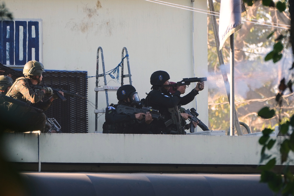 Guatemalan police free hostages in prison as attacks kill 3 officers
