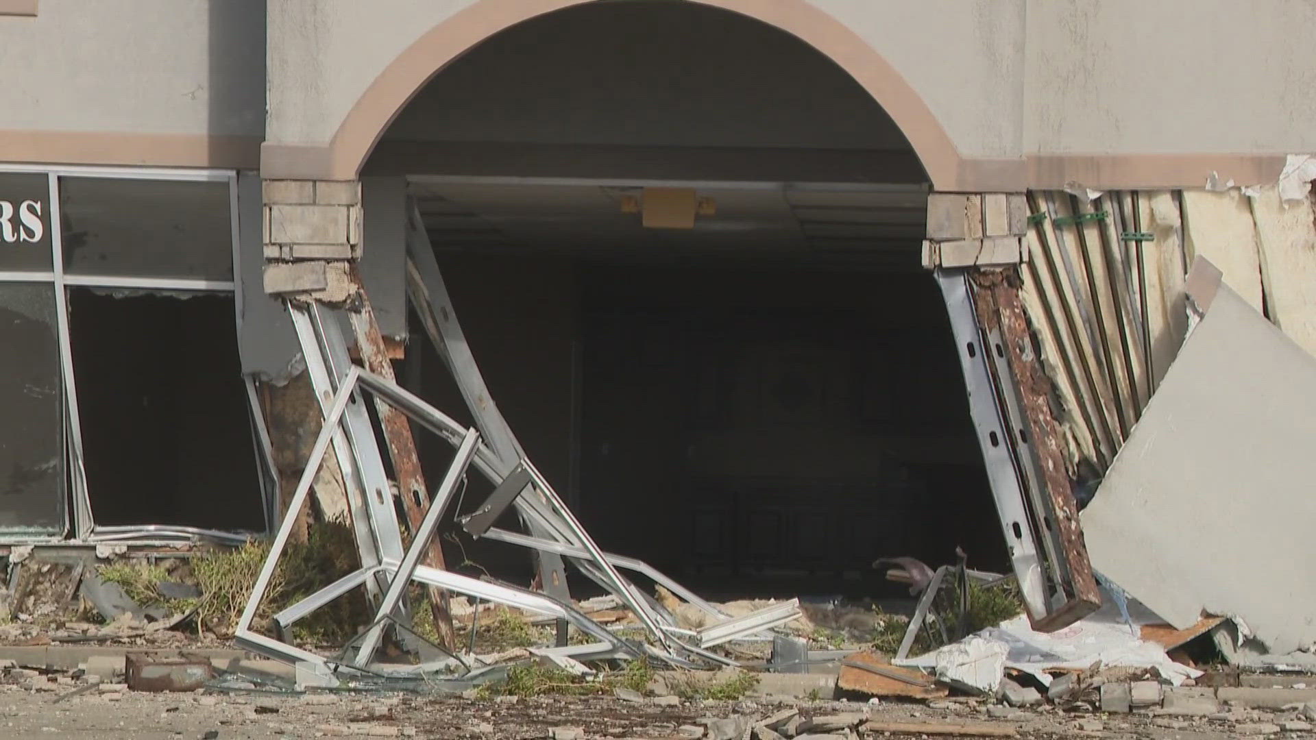Three people hospitalized after car crashes into building in Rogers