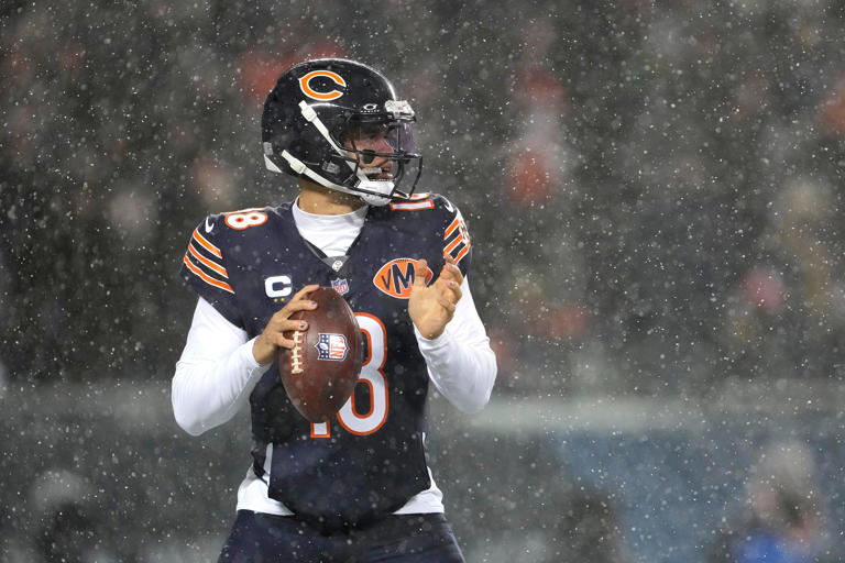 Matthew Stafford reacts to Caleb Williams' improbable throw vs. Rams