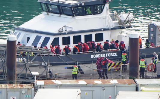 People are taken to the Border Force compound in Dover (Gareth Fuller/PA) (PA Wire)