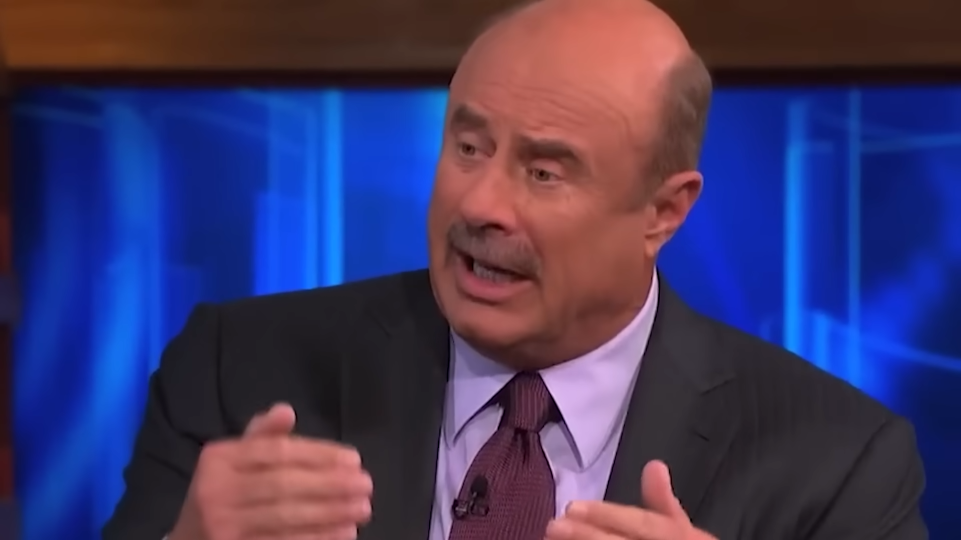 Dr. Phil called him out while a killer smirked on TV