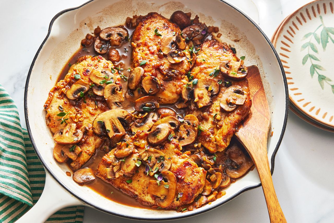 Balsamic Chicken and Mushrooms in a white skillet to serve